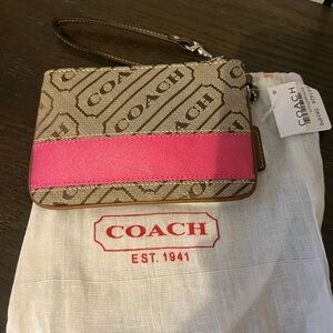 Coach Signature Tan Wristlet with Pink Accent